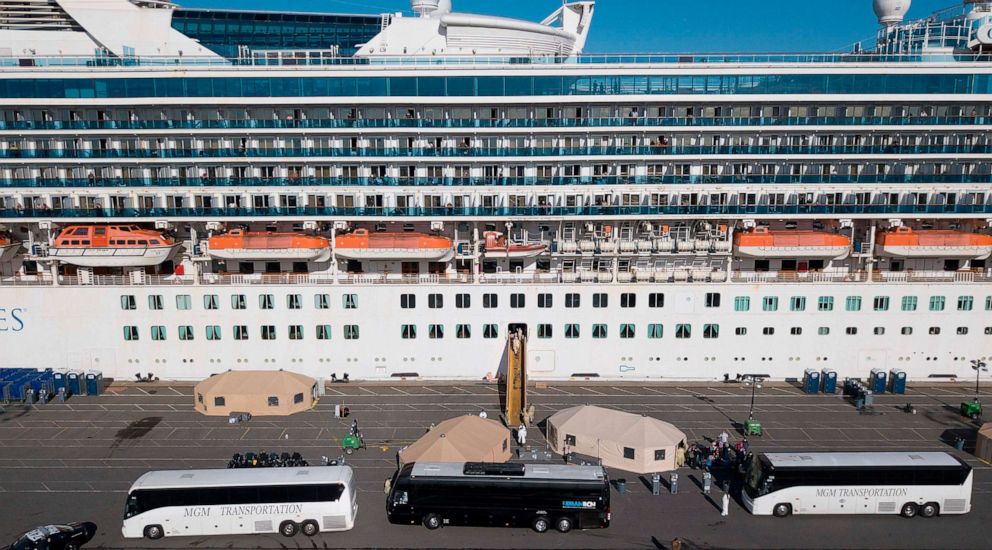 PHOTO: Medical Personnel help load passengers onto busses as they are disembarked from the Grand Princess cruise ship at the Port of Oakland in Oakland, Calif., March 10, 2020.