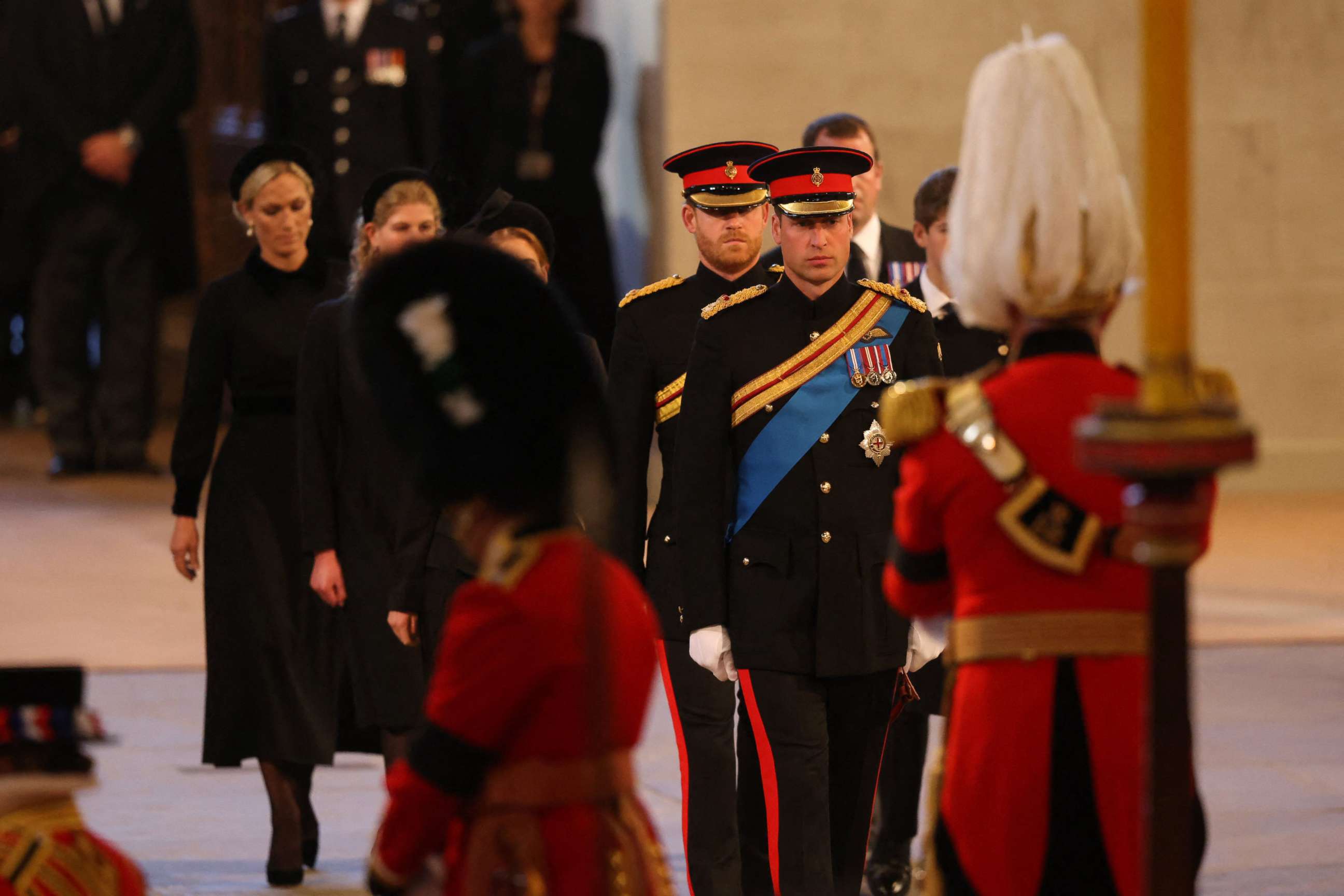 PHOTO: Prince William, Prince of Wales, Prince Harry, Duke of Sussex, arrive to mount a vigil around the coffin of Queen Elizabeth II, lying in state on the catafalque in Westminster Hall, at the Palace of Westminster in London on September 16, 2022.