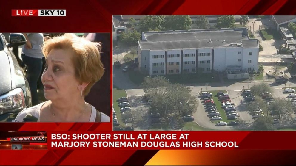 PHOTO: A woman said she was visiting from New York and was waiting to hear from her granddaughter at Stoneman Douglas High School in Parkland, Fla., Feb. 14, 2018.