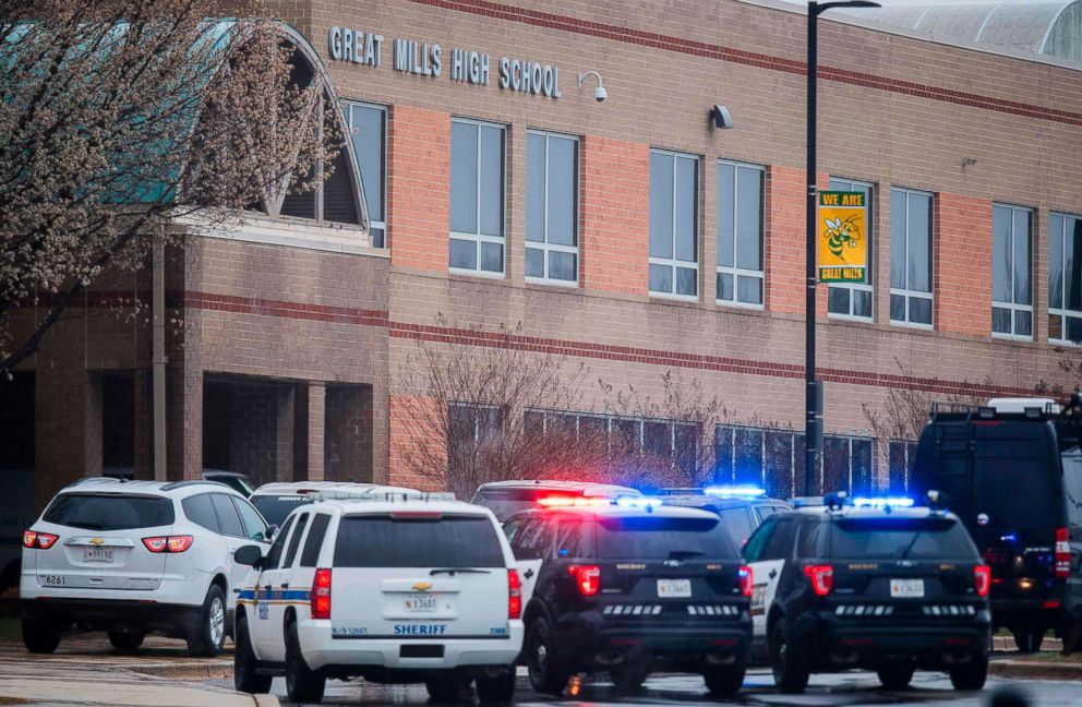 PHOTO: Law enforcement vehicles are parked in front of the Great Mills High School in Great Mills, Maryland after a shooting at the school on March 20, 2018.