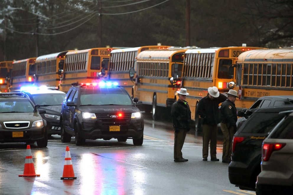 PHOTO: School buses are lined up in front of Great Mills High School after a shooting on March 20, 2018 in Great Mills, Md.