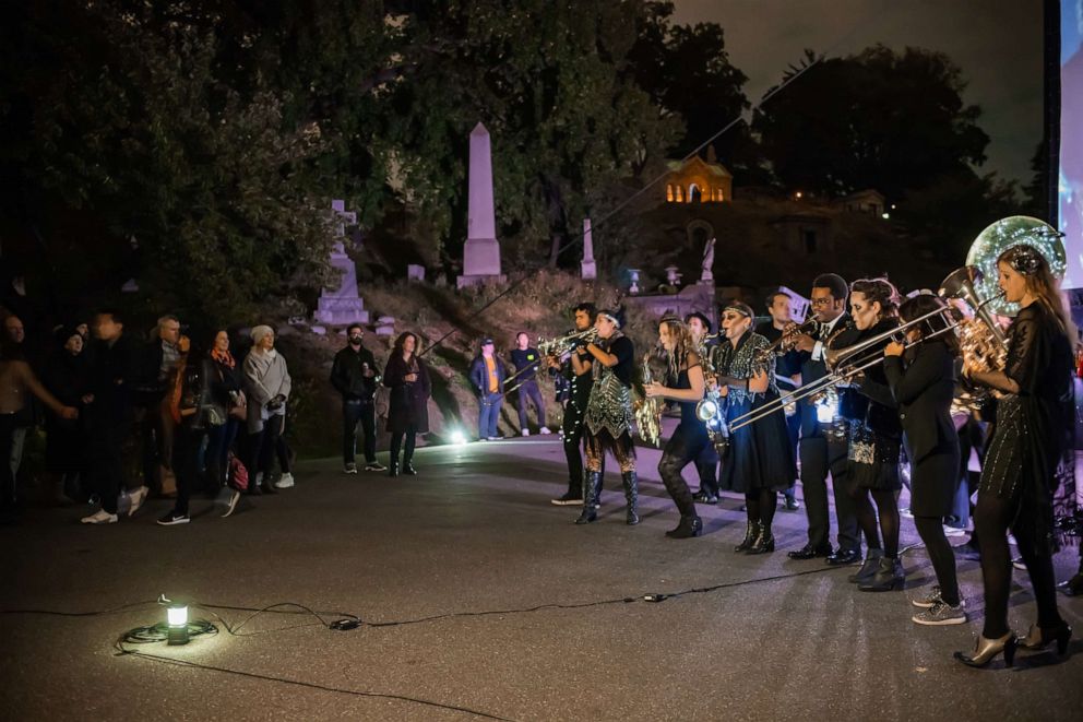 PHOTO: Performers in Nightfall at Green-Wood Cemetery in Brooklyn, New York, in 2018.