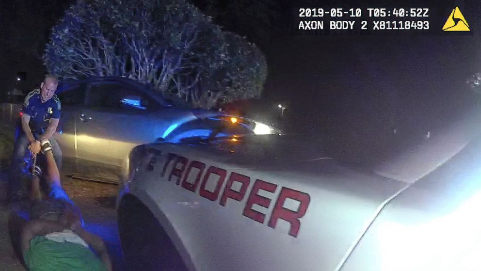 PHOTO: This image from video from Louisiana state police state trooper Dakota DeMoss' body-worn camera, shows trooper Kory York grabbing the leg shackles and dragging Ronald Greene on his stomach, May 10, 2019, outside of Monroe, La.