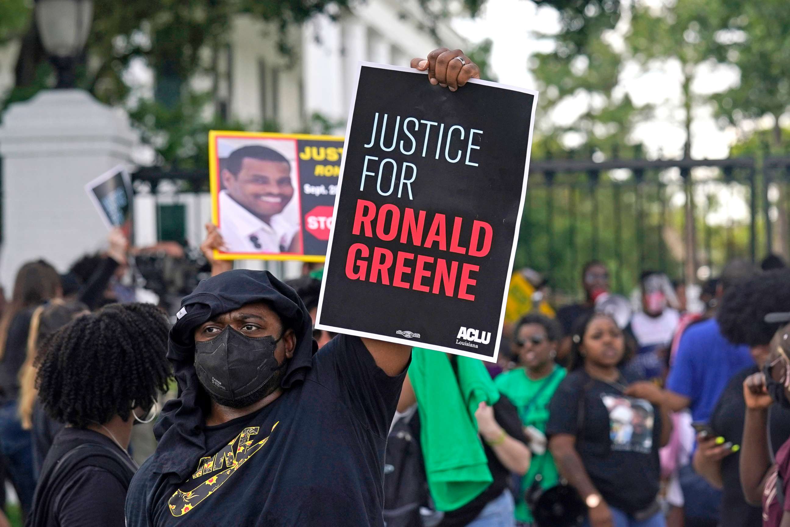 PHOTO: Demonstrators protesting the death of Ronald Greene, stand in front of the governor's mansion after a march from the state Capitol in Baton Rouge, La., May 27, 2021. Greene died in the custody of Louisiana State Police in 2019.