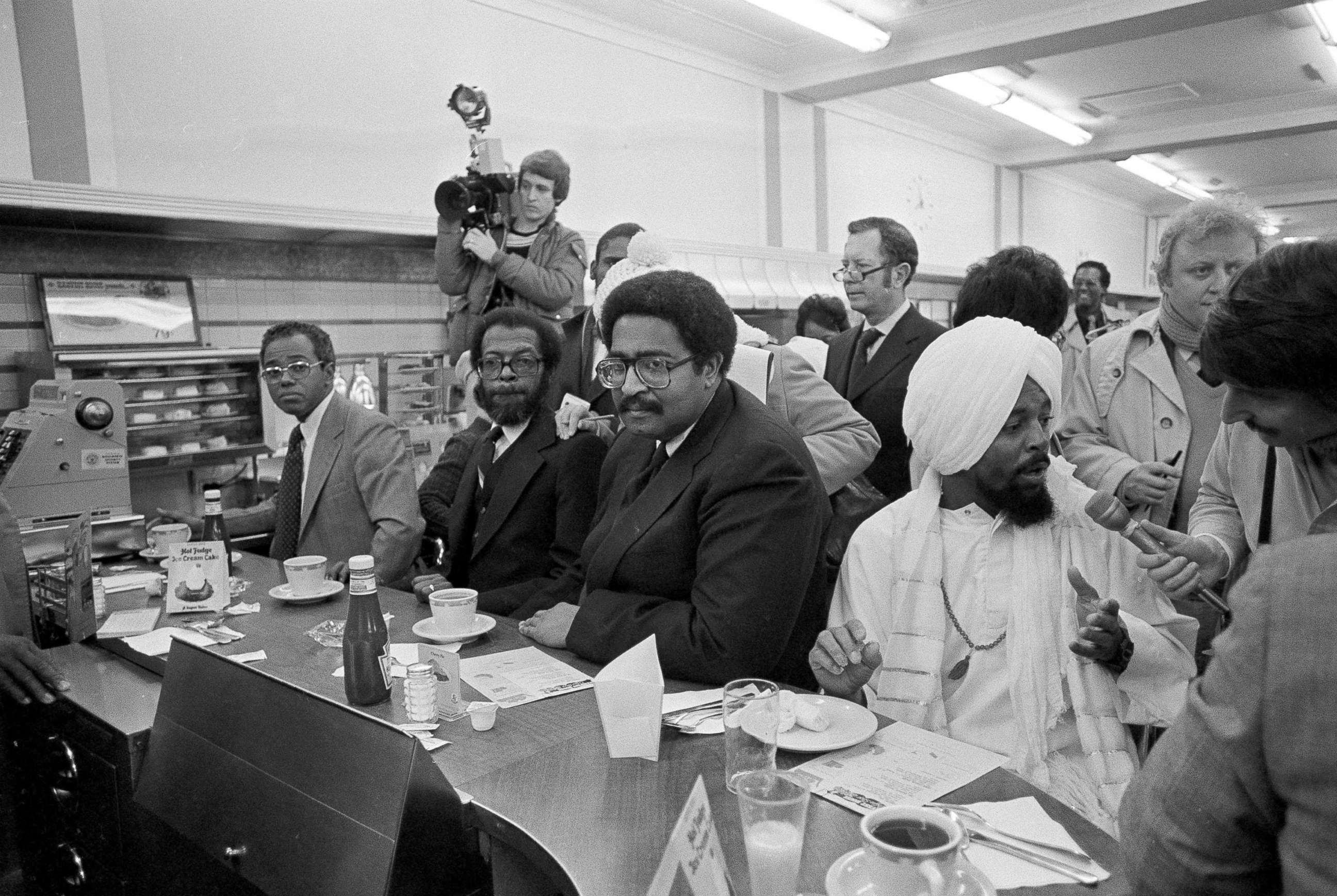 PHOTO: From left, Joseph McNeill, David Richmond, Franklin McCain and Jibreel Khazan, sit at the F.W. Woolworth lunch counter in Greensboro, N.C., Feb. 1, 1980, during events to mark the 20th anniversary of their historic sit-in.