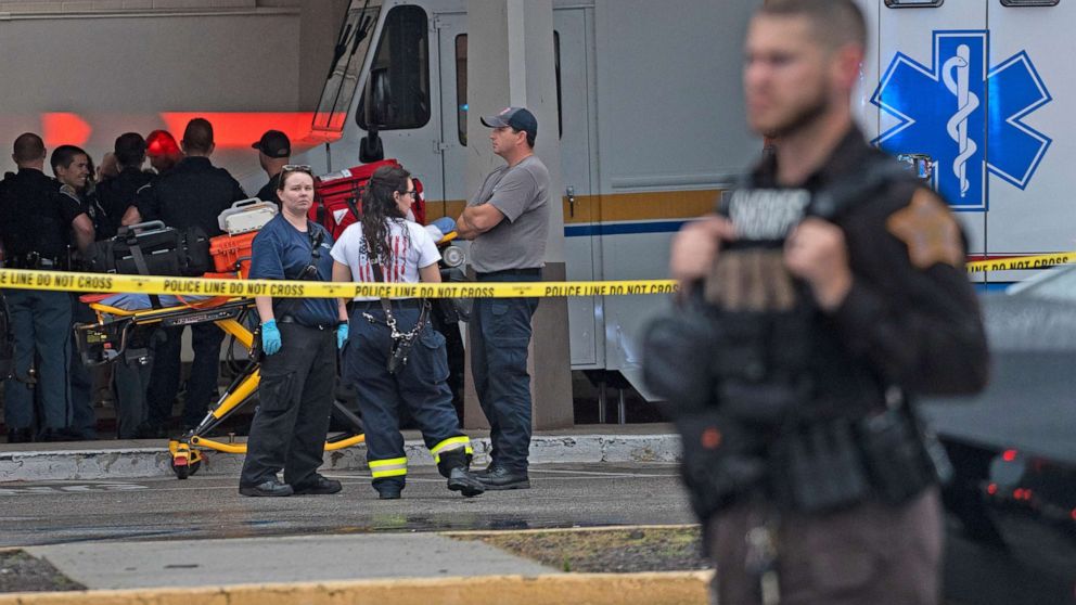 PHOTO: Emergency personnel gather after a shooting, July 17, 2022, at Greenwood Park Mall, in Greenwood, Ind.