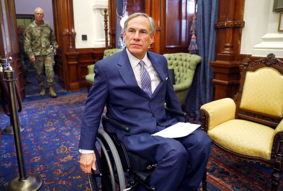 PHOTO: Texas Governor Greg Abbott arrives for a press conference at the Texas State Capitol in Austin, March 29, 2020.