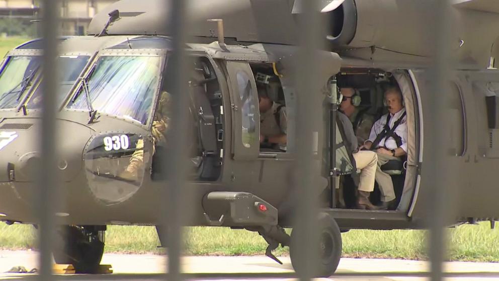 PHOTO: Texas Gov. Greg Abbott prepares to take off in a helicopter to fly over the the Kerrville flood damage, July 8, 2025.