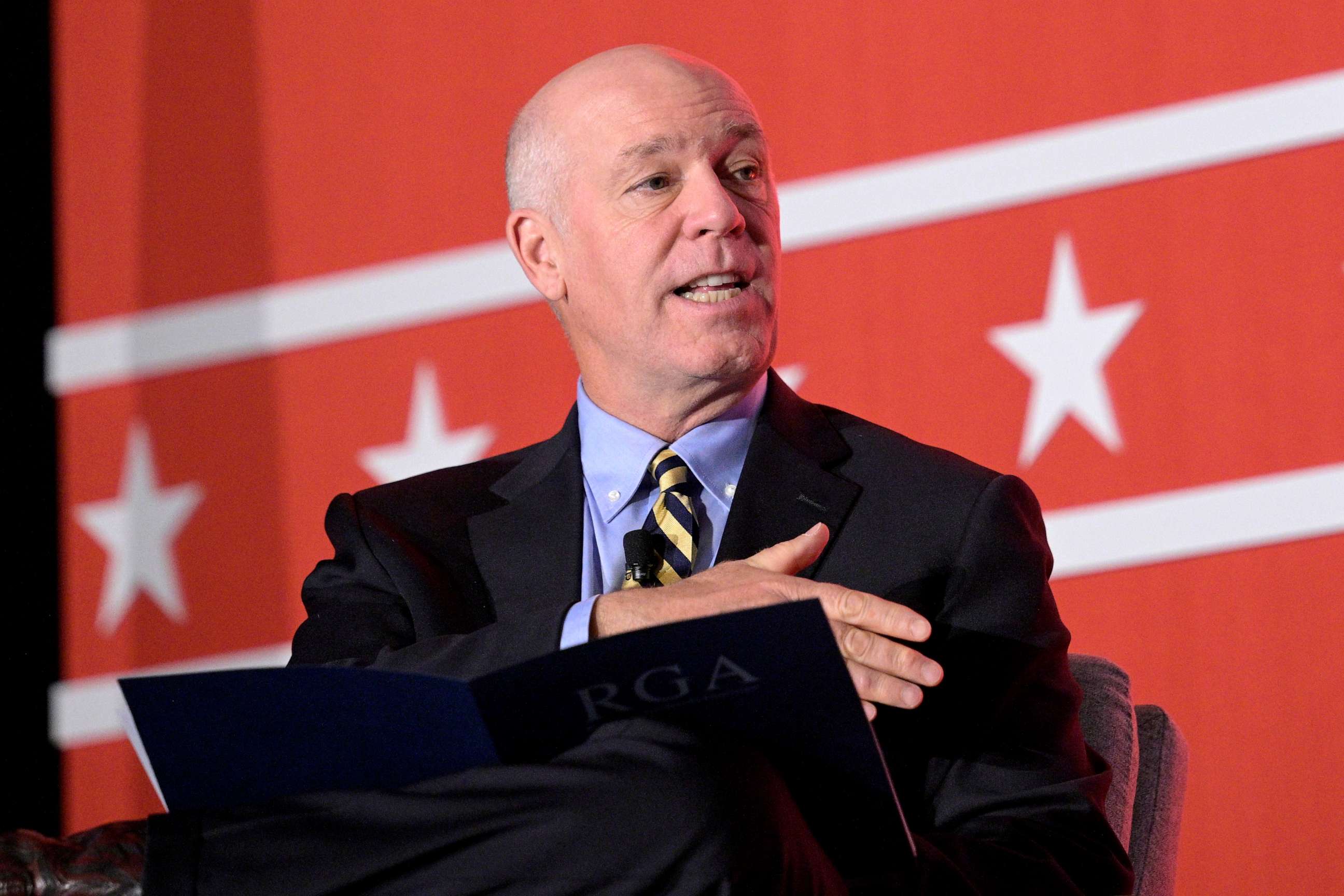 PHOTO: Montana Gov. Greg Gianforte poses a question while taking part in a panel discussion during a Republican Governors Association conference, Nov. 16, 2022, in Orlando, Fla.