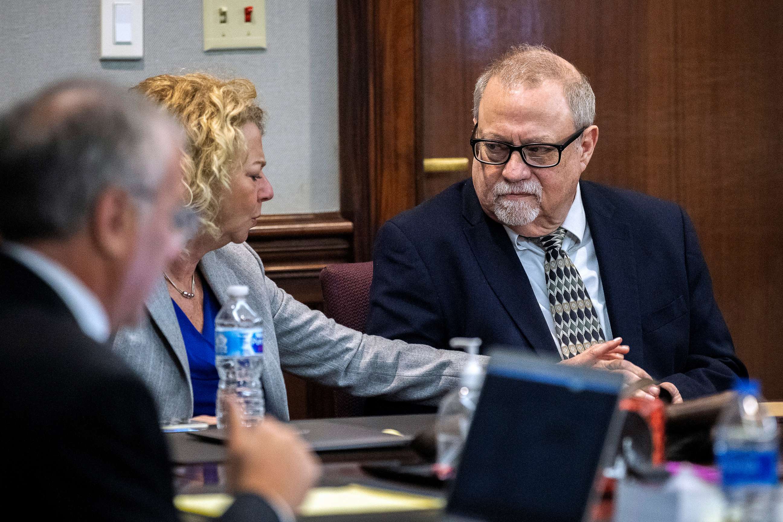 PHOTO: Defense attorney Laura Hogue, center, touches the hand of her client Greg McMichael, right, while they wait for the jury during the trial, Nov. 24, 2021, in Brunswick, Ga.