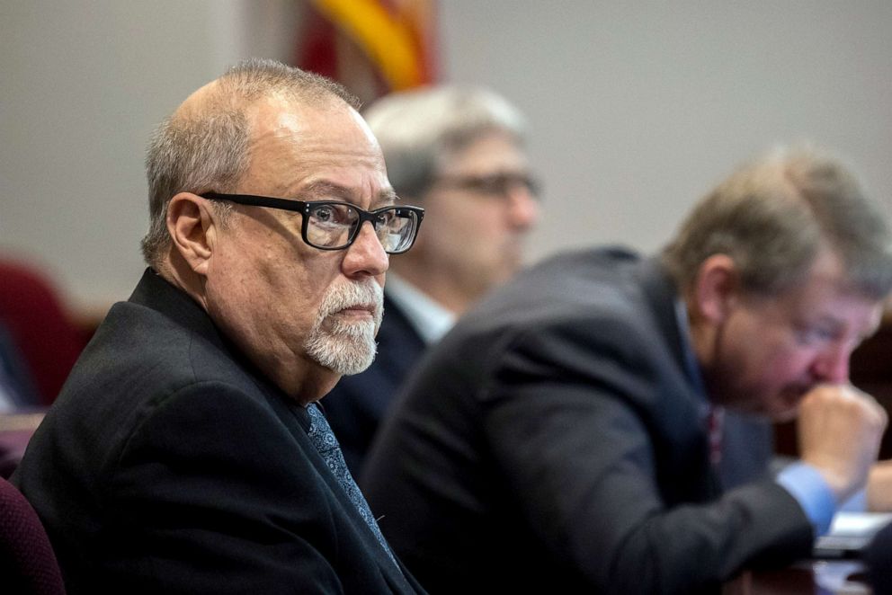 PHOTO: Greg McMichael, left, listens to jury selection for the trial of him and his son, Travis McMichael, and William "Roddie" Bryan, Oct. 25, 2021, in Brunswick, Ga. The three are charged with the slaying of 25-year-old Ahmaud Arbery.