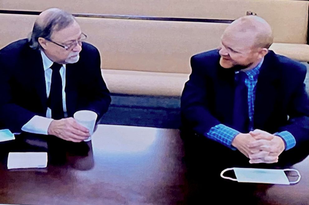 PHOTO: In this image made from video, from left, Gregory and Travis McMichael speak to each other in the Glynn County Detention center in Brunswick, Ga., Nov. 12, 2020.
