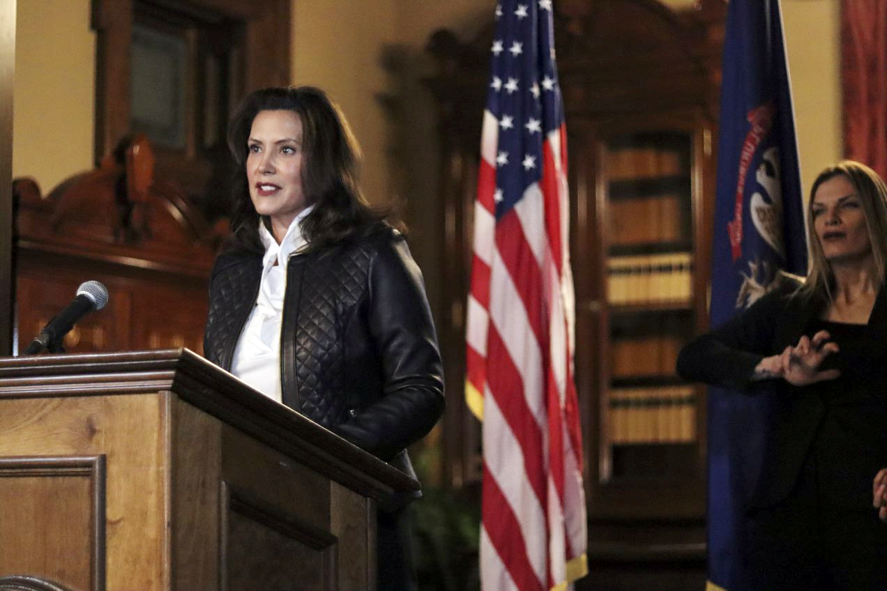 PHOTO: Michigan Governor Gretchen Whitmer speaks during a news conference after thirteen people were arrested for alleged plots to take Whitmer hostage and attack the state capitol building, in Lansing, Mich., Oct. 8, 2020.