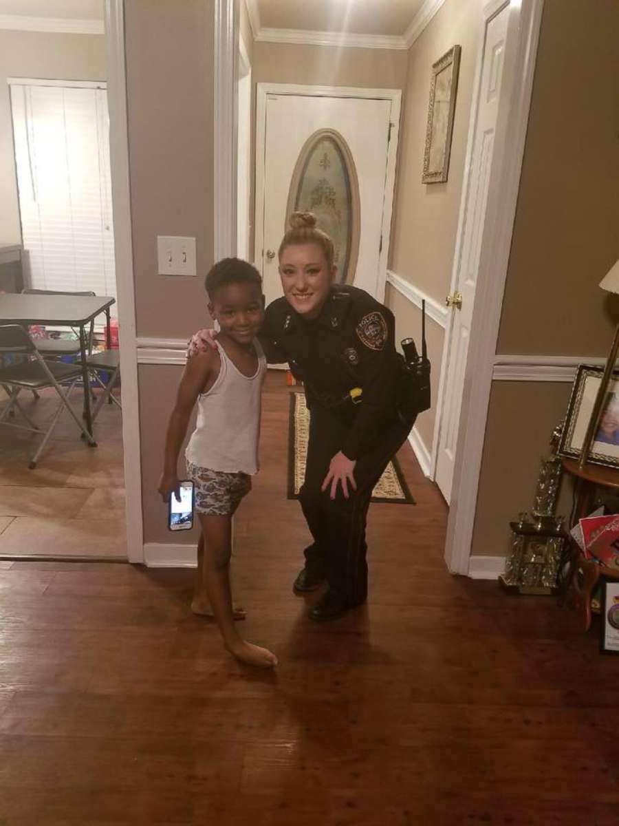 PHOTO: On Saturday Dec. 16, 5-year-old TyLon Pittman called 911 because he was afraid that the Grinch would steal his Christmas, and Officer Lauren Develle from Mississippi's Byram Police Department showed up to assure him that would never happen.