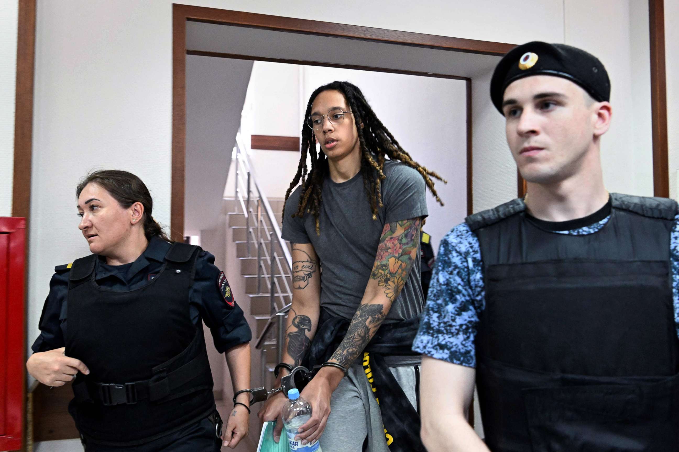 PHOTO:  U.S. basketball star Brittney Griner, in handcuffs, arrives to hearing in Khimki court outside Moscow, June 27, 2022.