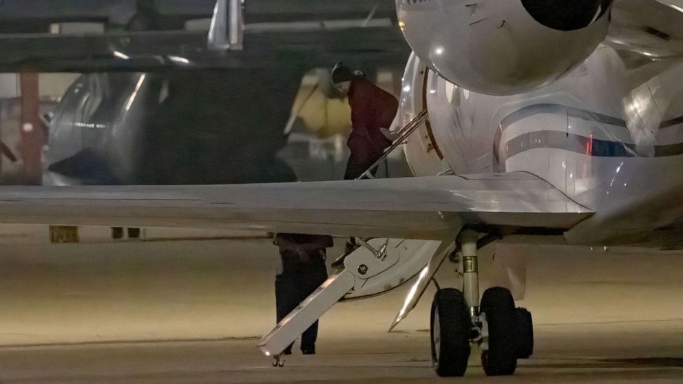 PHOTO: TOPSHOT - American basketball star Brittney Griner gets out of a plane after landing at the JBSA-Kelly Field Annex runway on December 9, 2022 in San Antonio, after she was released from a Russian prison in exchange for a notorious arms dealer.