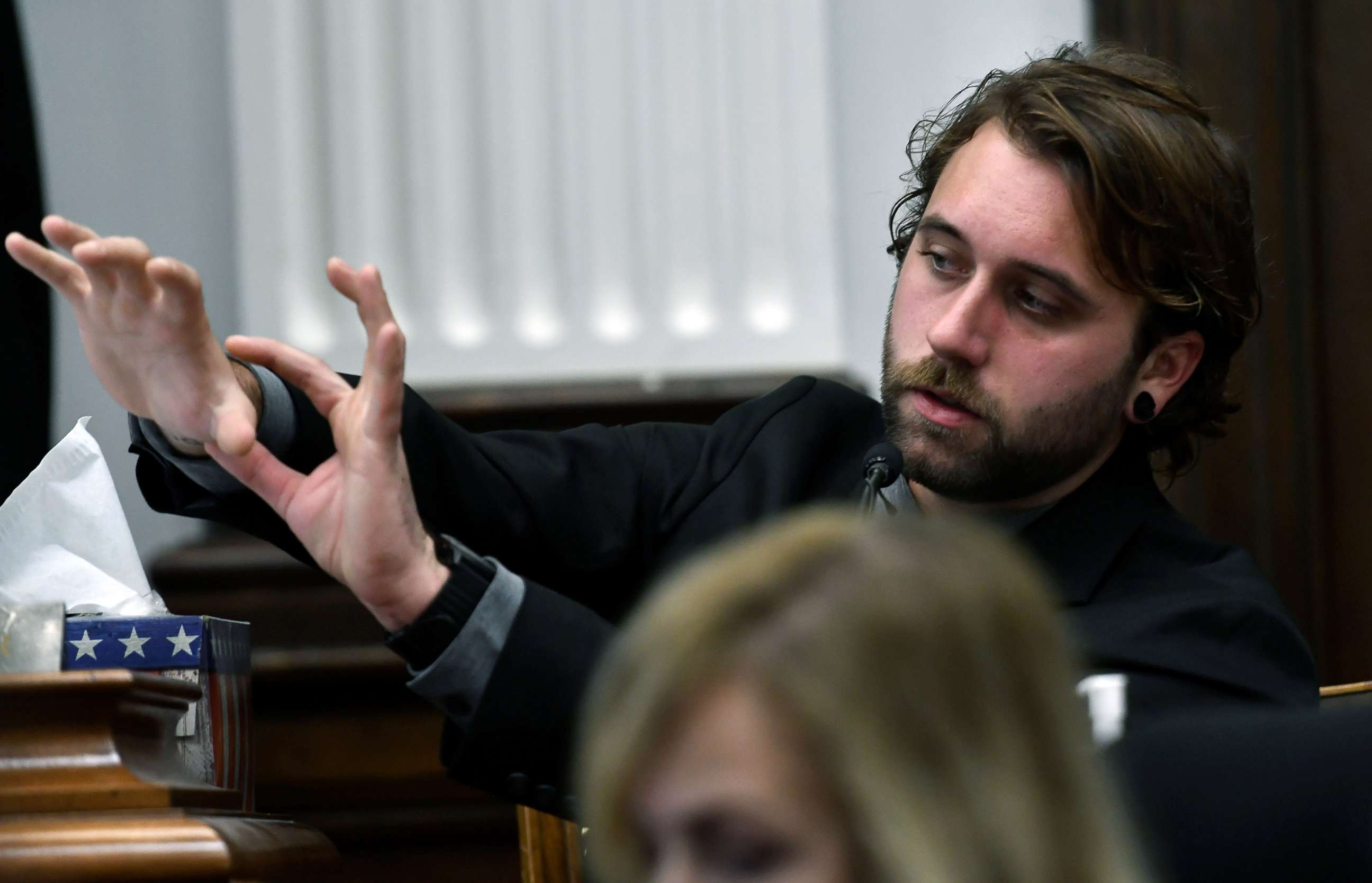 PHOTO: Gaige Grosskreutz talks about the lasting damage done to his arm from the gunshot wound received from Kyle Rittenhouse as he testifies at the Kenosha County Courthouse in Kenosha, Wis., Nov. 8, 2021.