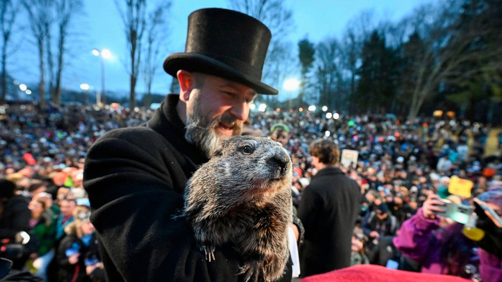 PHOTO: Groundhog Club handler A.J. Dereume holds Punxsutawney Phil, the weather prognosticating groundhog, during the 138th celebration of Groundhog Day on Gobbler's Knob in Punxsutawney, Pa., Feb. 2, 2024.