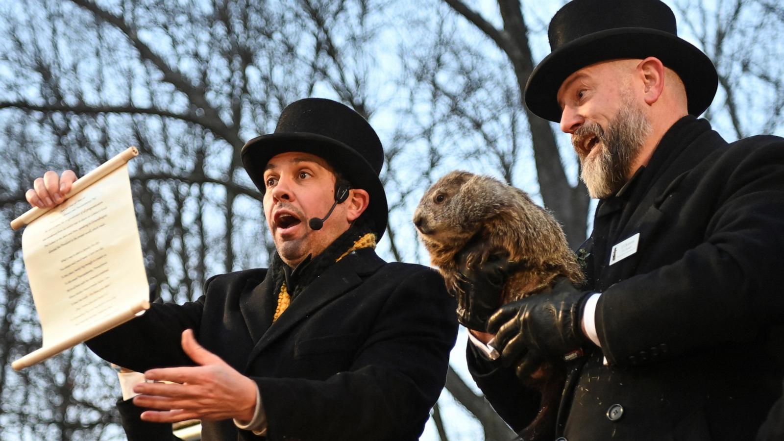 PHOTO: AJ Dereume holds up groundhog Punxsutawney Phil, as he makes his prediction on how long winter will last, during the Groundhog Day festivities, at Gobbler's Knob in Punxsutawney, Pennsylvania, Feb. 2, 2025.