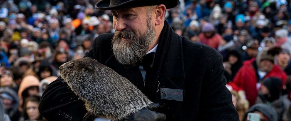 PHOTO: Groundhog handler AJ Derume holds Punxsutawney Phil, who saw his shadow, predicting a late spring during the 136th annual Groundhog Day festivities on Feb. 2, 2023 in Punxsutawney, Penn.