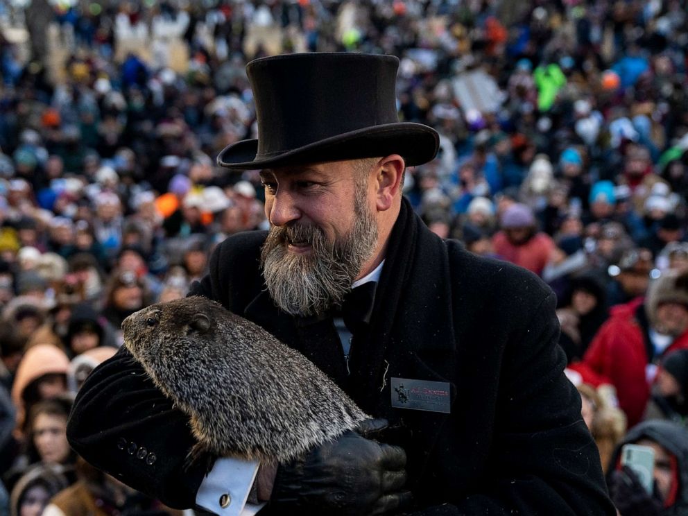 PHOTO: Groundhog handler AJ Derume holds Punxsutawney Phil, who saw his shadow, predicting a late spring during the 136th annual Groundhog Day festivities on Feb. 2, 2023 in Punxsutawney, Penn.