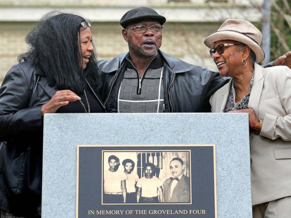 PHOTO: From left, Vivian Shepherd, niece of Sam Shepherd; Gerald Threat, nephew of  Walter Irvin; Carol Greenlee, daughter of Charles Greenlee, gather at the just-unveiled monument in front of the County courthouse in Tavares, Fla., Feb. 21, 2020.