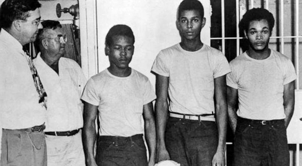 PHOTO: Lake County Sheriff Willis McCall and an unidentified man stand next to Walter Irvin, Samuel Shepherd and Charles Greenlee, in Fla. The three men along with Ernest Thomas were charged with rape in 1949. the men were granted posthumous pardons.