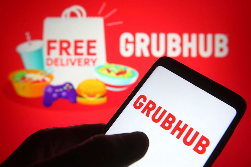 PHOTO: The logo of the food ordering and delivery platform Grubhub is seen on a smartphone in an illustration.