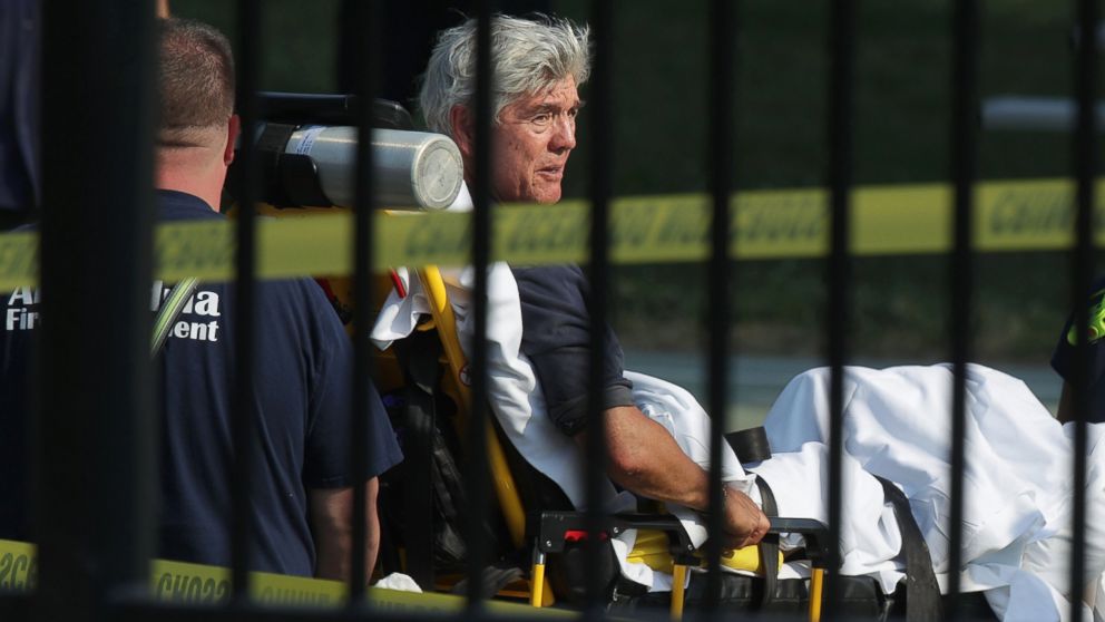 PHOTO: Rep. Roger Williams is wheeled away by emergency medical service personnel from the Eugene Simpson Stadium Park June 14, 2017 in Alexandria, Va., following a shooting at the park. 