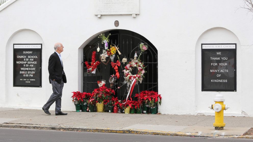 PHOTO: A man stops to observe the makeshift memorial in front of Mother Emanuel AME Church in downtown Charleston, South Carolina on Jan. 4, 2017.