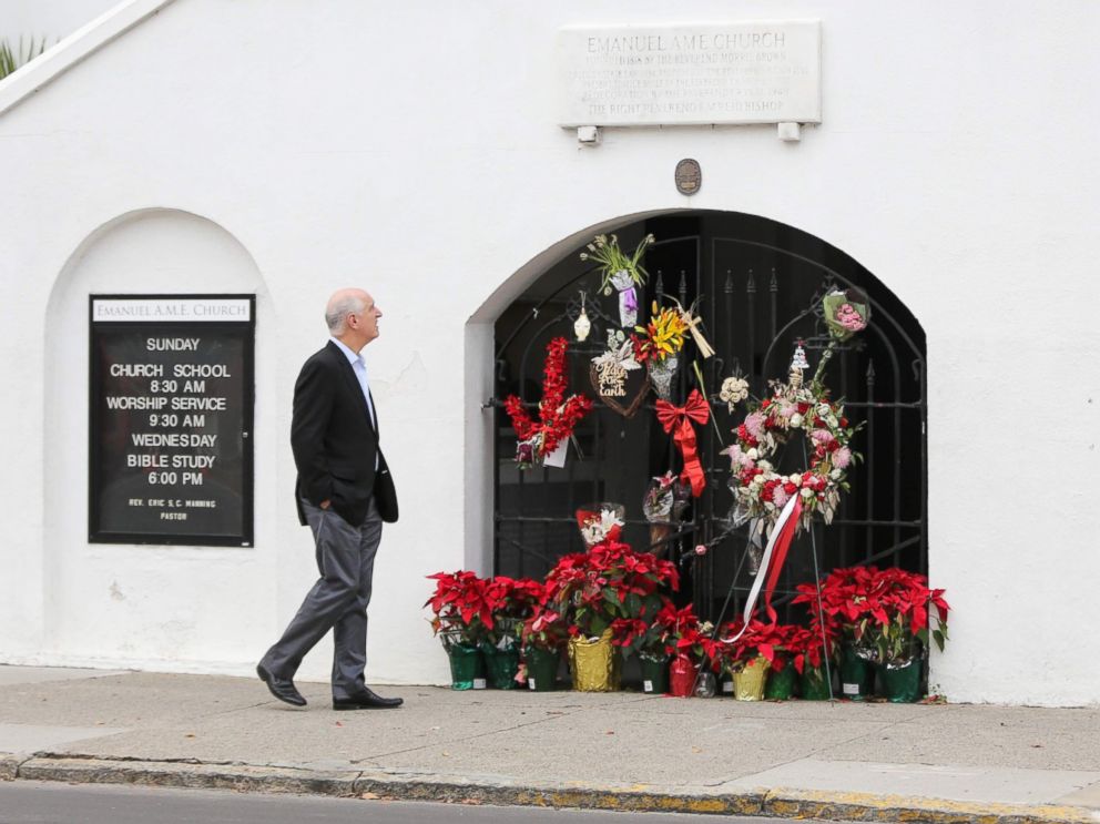 PHOTO: A man stops to observe the makeshift memorial in front of Mother Emanuel AME Church in downtown Charleston, South Carolina on Jan. 4, 2017.