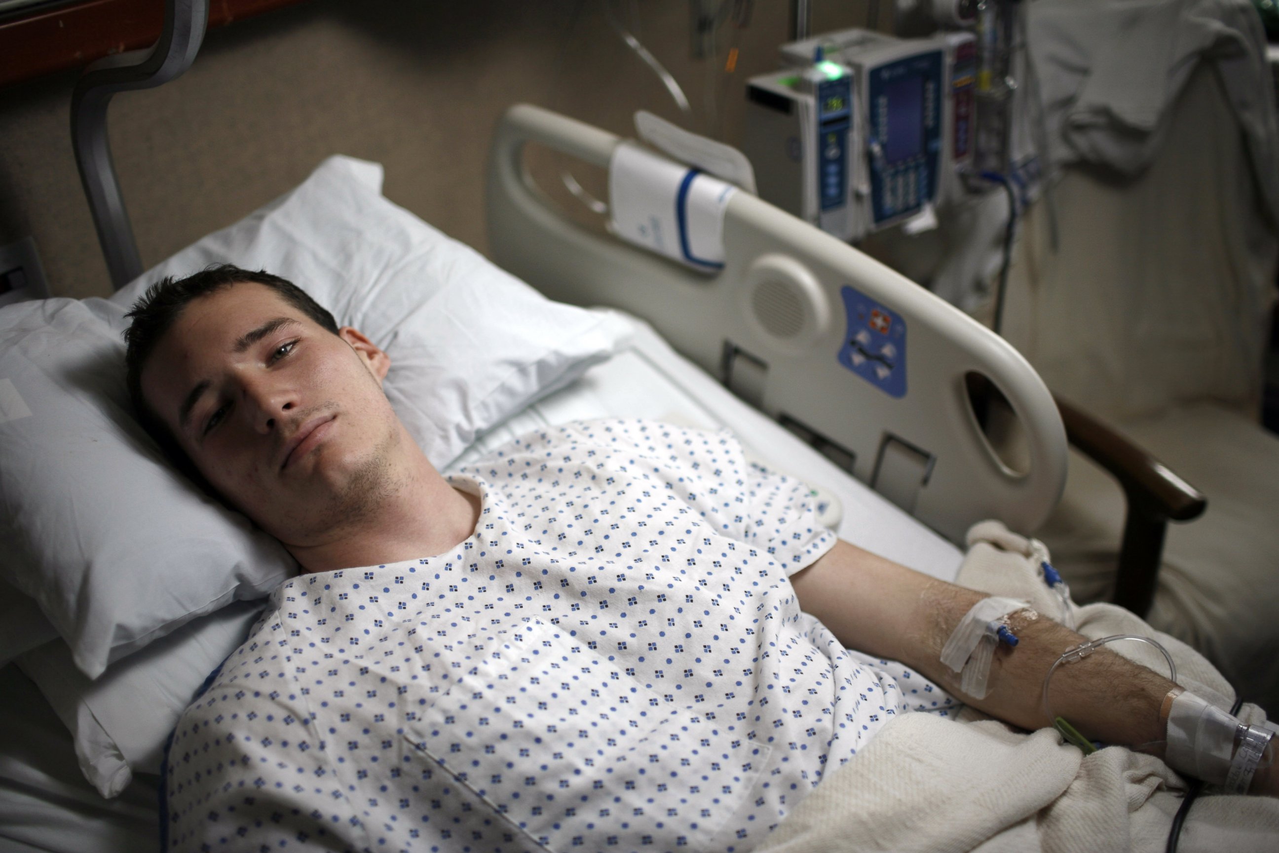 PHOTO: Virginia Tech student Colin Goddard lies in his hospital bed on April 19, 2007 in Blacksburg, Va.
