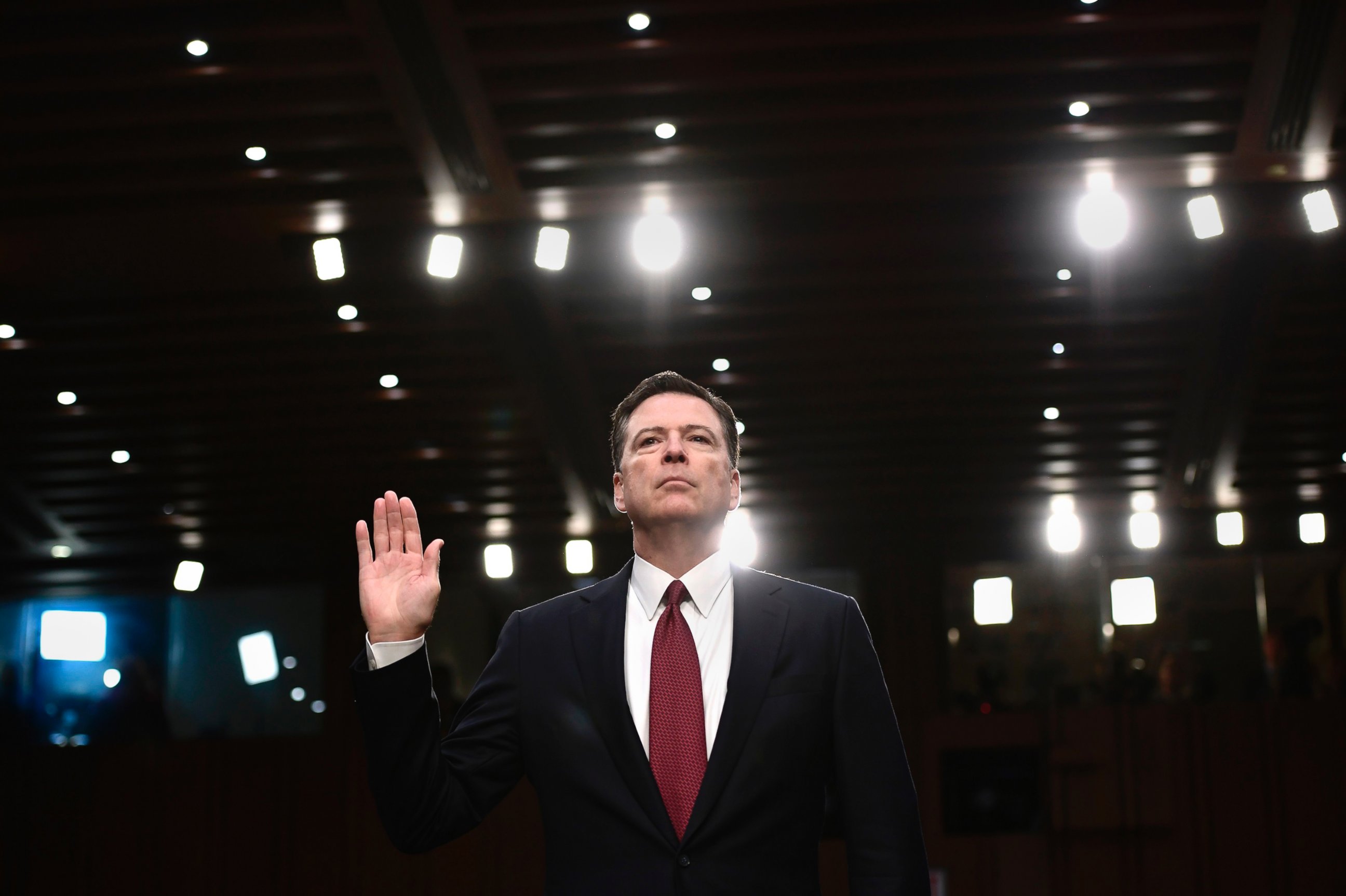 PHOTO: Former FBI Director James Comey takes the oath before he testifies during a Senate Select Committee on Intelligence hearing on Capitol Hill in Washington, D.C., June 8, 2017. 