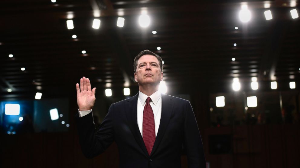 PHOTO: Former FBI Director James Comey takes the oath before he testifies during a Senate Select Committee on Intelligence hearing on Capitol Hill in Washington, D.C., June 8, 2017. 