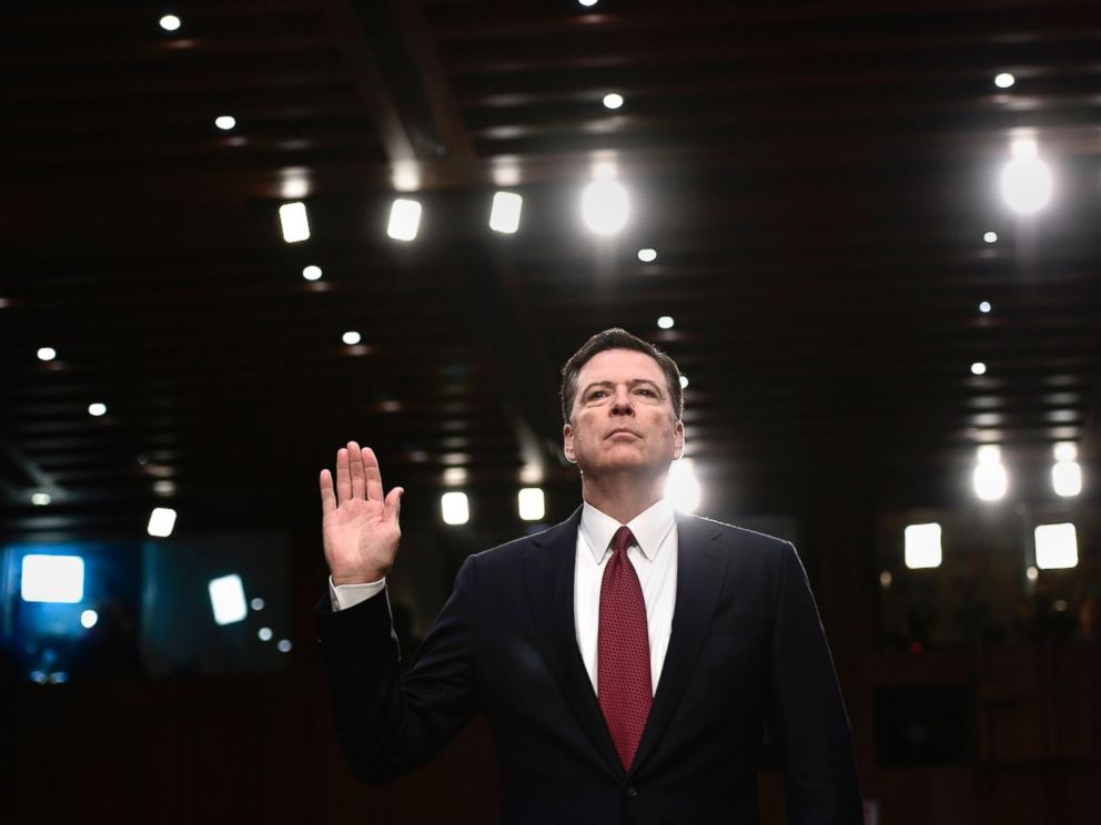 PHOTO: Former FBI Director James Comey takes the oath before he testifies during a Senate Select Committee on Intelligence hearing on Capitol Hill in Washington, D.C., June 8, 2017. 