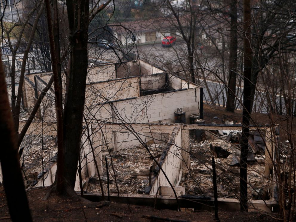 PHOTO: The remains of a business are pictured in the wake of a wildfire, Nov. 30, 2016, in Gatlinburg, Tennessee.