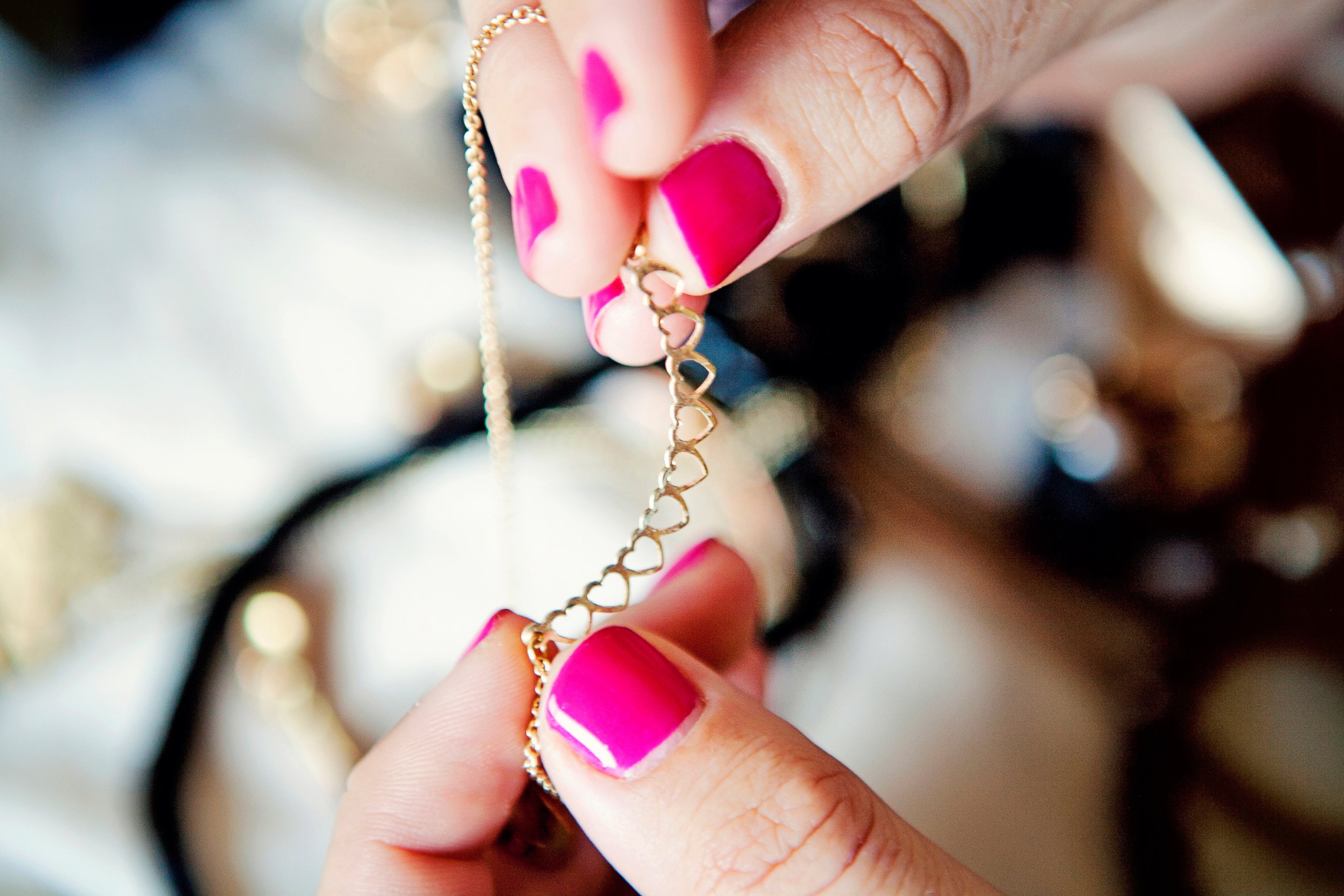 PHOTO: A woman holds jewelry in an undated stock photo.