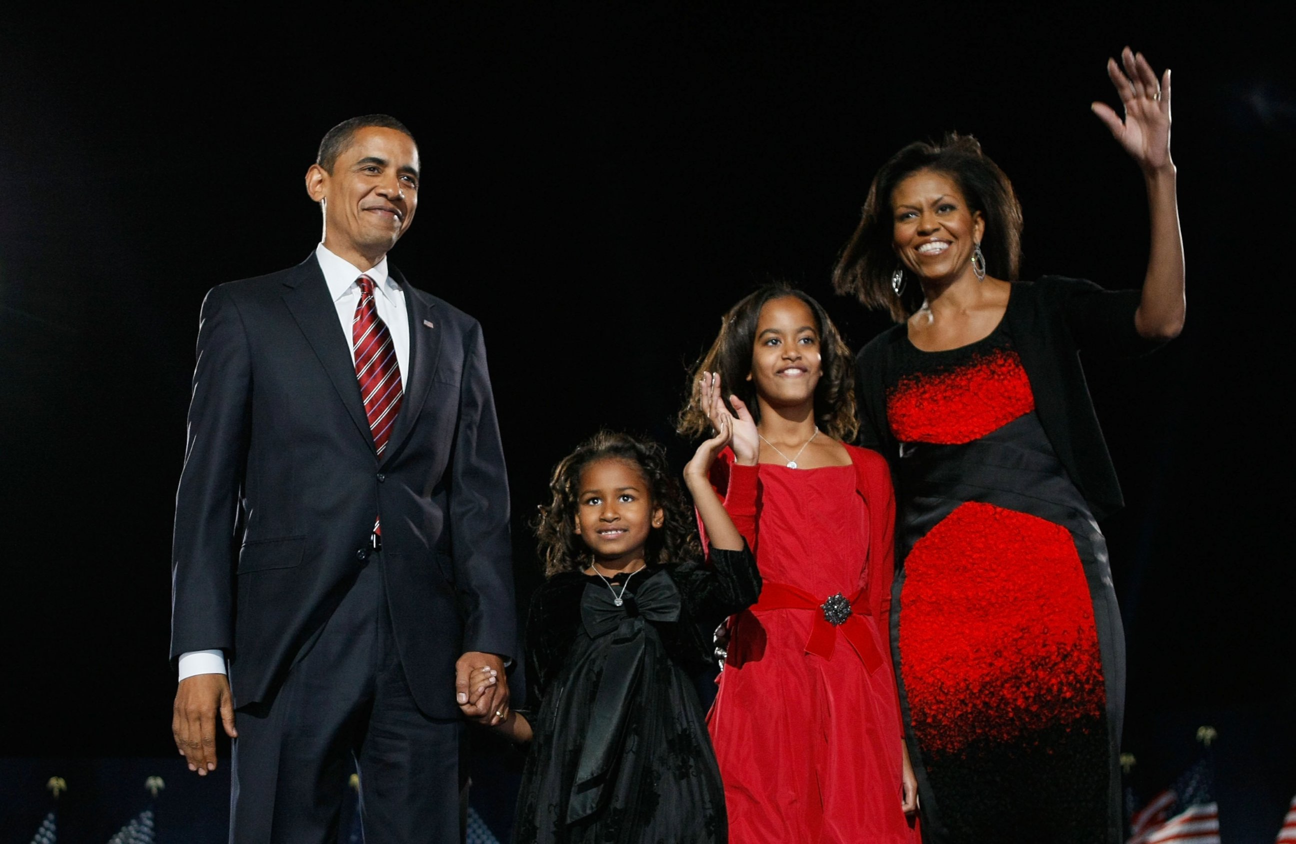 PHOTO: President elect Barack Obama stands on stage along with his wife Michelle and daughters Malia and Sasha during an election night gathering in Grant Park on Nov. 4, 2008 in Chicago.