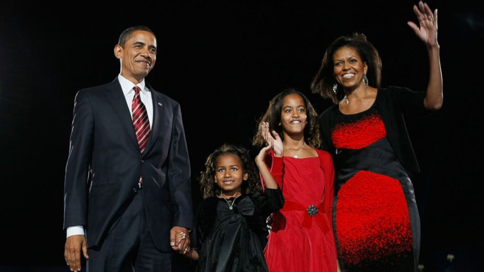 PHOTO: President elect Barack Obama stands on stage along with his wife Michelle and daughters Malia and Sasha during an election night gathering in Grant Park on Nov. 4, 2008 in Chicago.