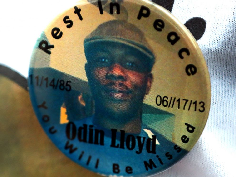 PHOTO: A funeral service was held for Odin Lloyd at the Holy Spirit Church in Mattapan. Lloyd was allegedly shot to death by former Patriots player Aaron Hernandez. A funeral-goer wears a button with his portrait.