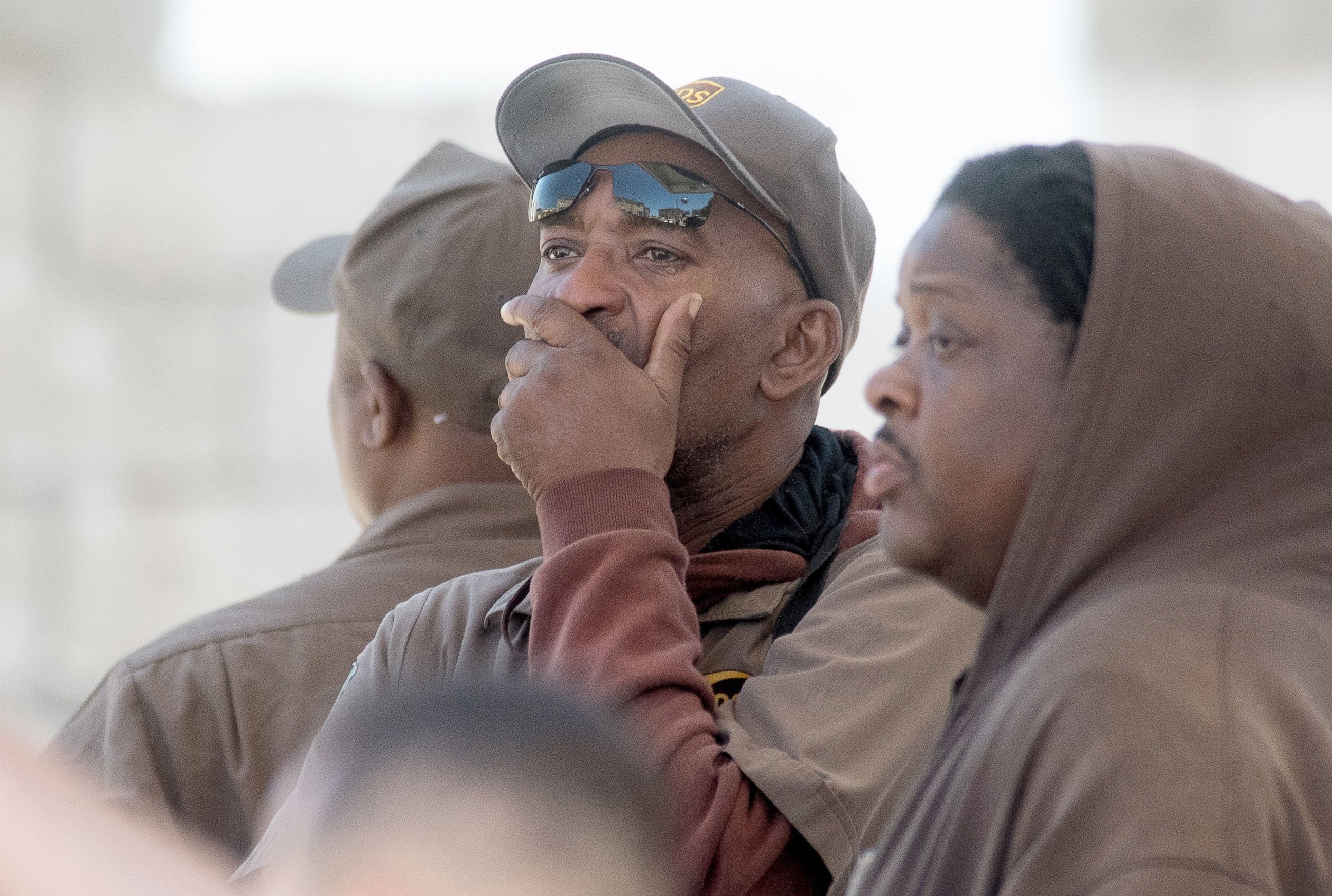 PHOTO: UPS workers react at the scene where a gunman shot and killed multiple people including himself at a UPS facility in San Francisco, California, June 14, 2017.