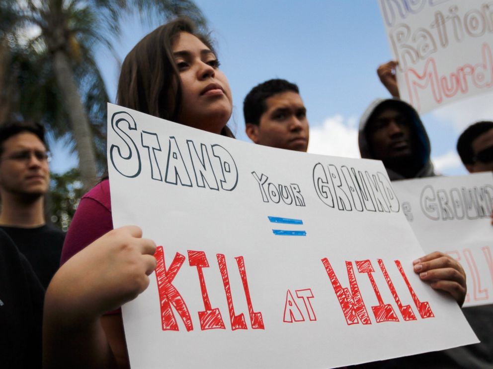 PHOTO: Grace Miranda and other demonstrators gather for a rally in front of Florida Senator Marco Rubios office asking him to retract his support for Floridas Stand Your Ground gun law following the Trayvon Martin killing on April 9, 2012 in Miami.