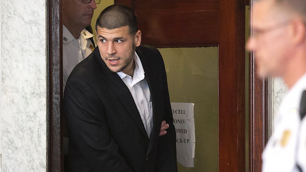 Former NFL tight end Aaron Hernandez appears during a probable cause hearing at Attleboro District Court, July 24, 2013, in Attleboro, Mass.