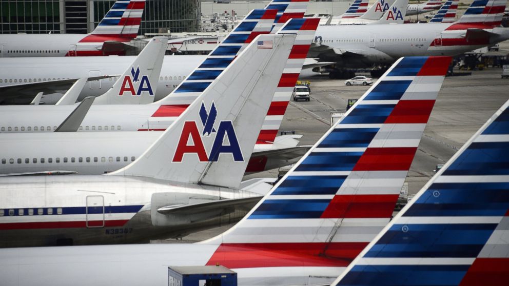 American Airlines passenger planes are seen on the tarmac at Miami International Airport in Miami, June 8, 2015.