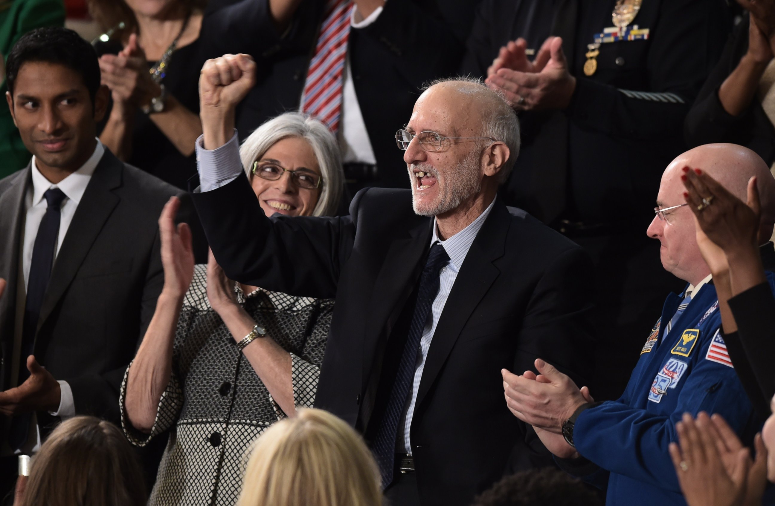 PHOTO: Alan Gross, the U.S. contractor released from prison in Cuba last month, is applauded during US President Barack Obama's State of the Union address in Washington on Jan. 20, 2015.