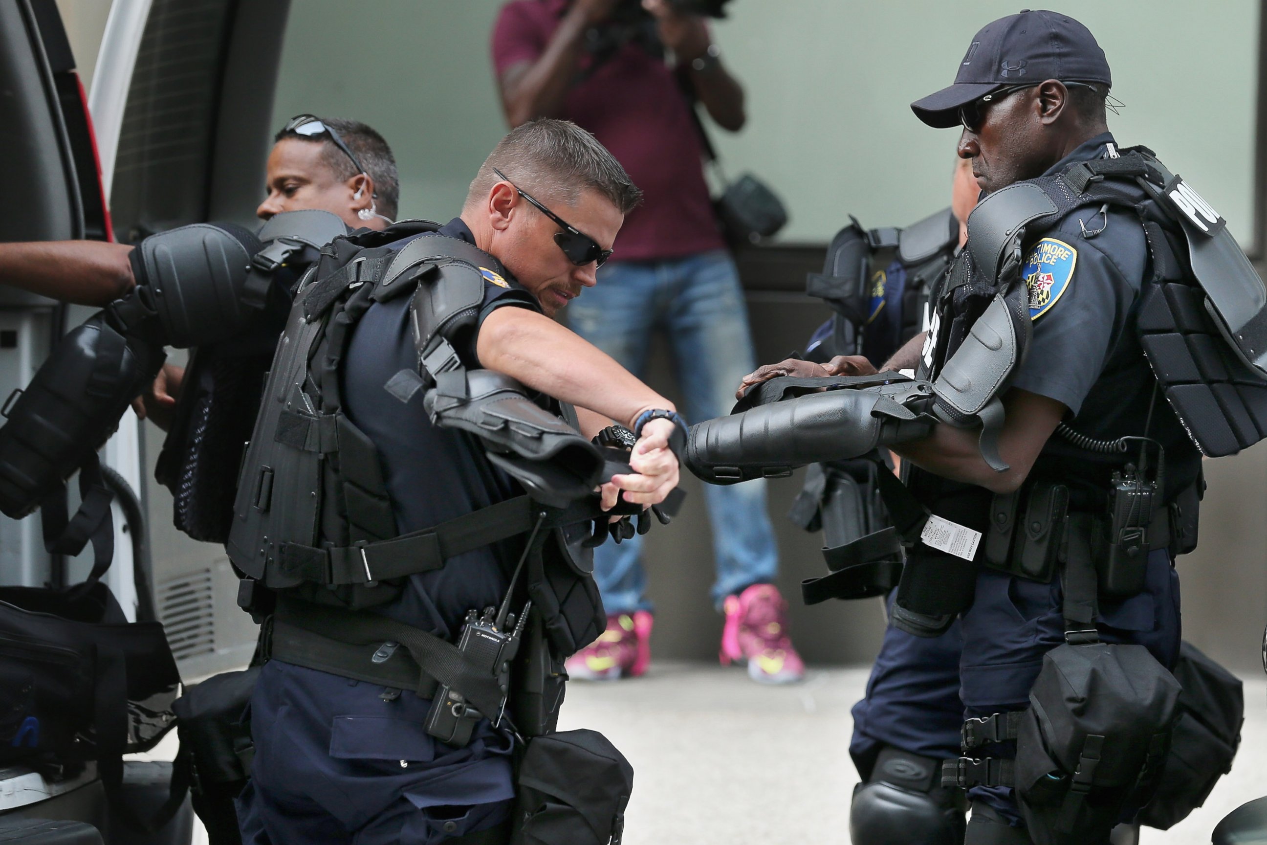 PHOTO: Baltimore City police don riot gear near a demonstration at the Inner Harbor, Sept. 2, 2015 in Baltimore, Maryland.