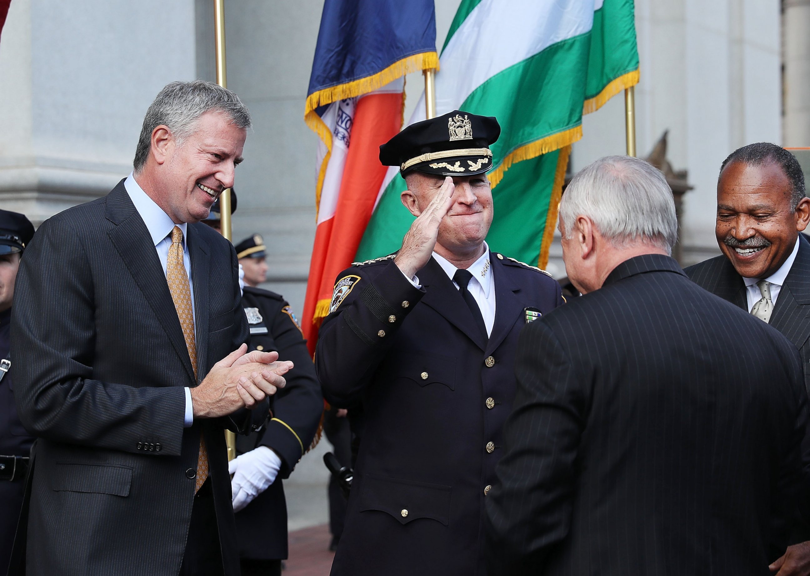 PHOTO: New York City Police Commissioner Bill Bratton is saluted by incoming Police Commissioner James "Jimmy" O'Neill as he walks through 1 Police Plaza in downtown Manhattan during a ceremonial send-off on Sept. 16, 2016 in New York City.