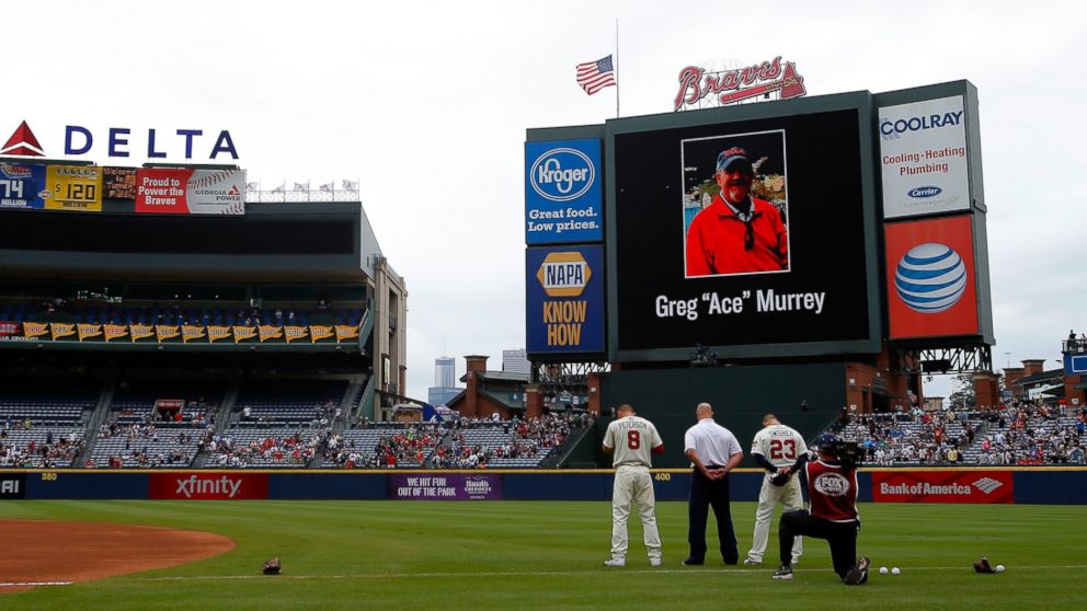 PHOTO: An American flag is lowered to half-staff in memory of Greg "Ace" Murrey who fell to his death at the game between the Atlanta Braves and the New York Yankees, Aug. 30, 2015 in Atlanta.