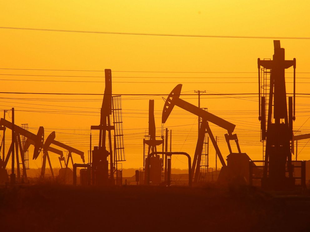 PHOTO: Pump jacks are seen at dawn in an oil field over the Monterey Shale formation where gas and oil extraction using hydraulic fracturing, or fracking, is on the verge of a boom on March 24, 2014 near Lost Hills, Calif.