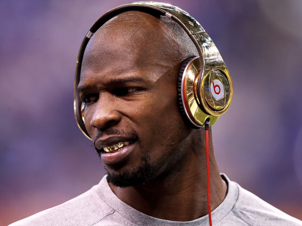 PHOTO: Chad Ochocinco Johnson of the New England Patriots waits on the field before Super Bowl XLVI at Lucas Oil Stadium on Feb. 5, 2012 in Indianapolis, Ind.